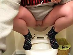 Piss peeing in toilet