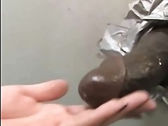 Alysa takes a huge black cock at the gloryhole