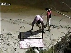 Another scene of the same couple on the beach