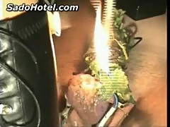 Balls and cock of slave gets shocks, burned with candlewax,